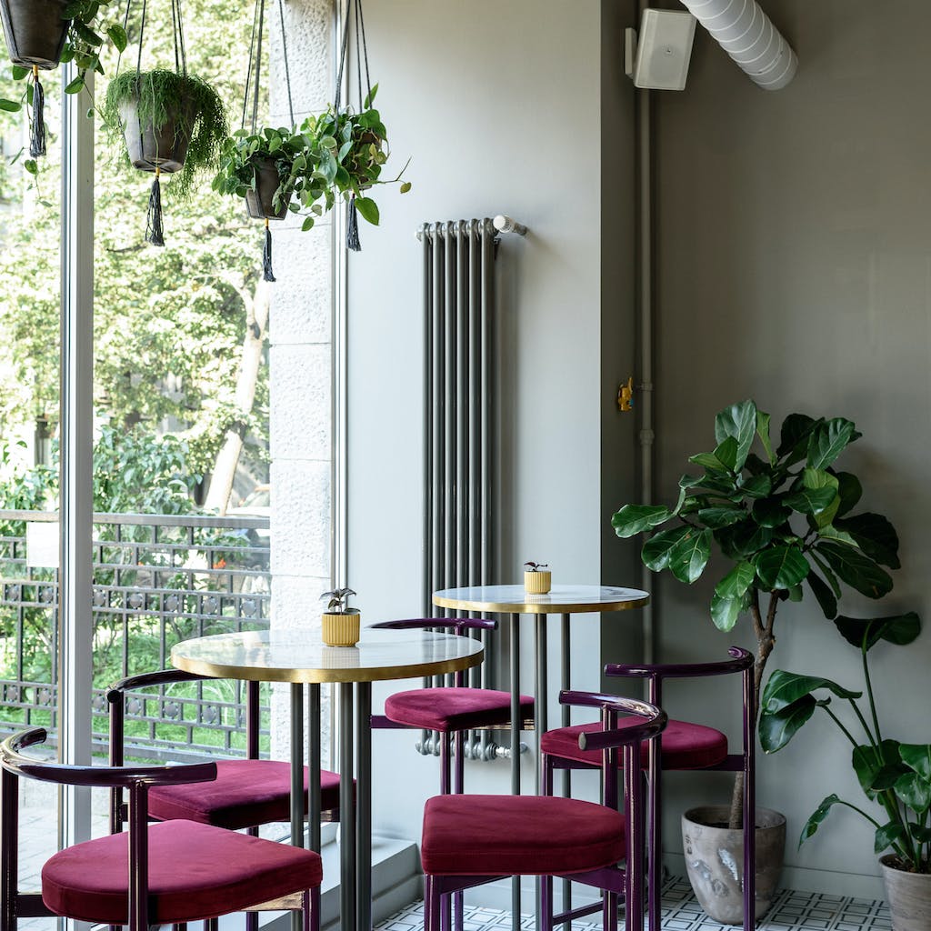Design Services of Restaurant having dining table under pendant lamp. We offer a range of construction engineering services